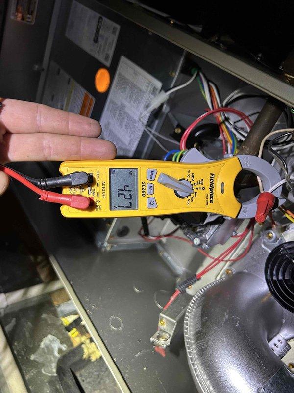 Completed preventative maintenance tune-up on dual HVAC systems located in basement and attic. Performed comprehensive electrical diagnostics using clamp meter, measuring amperage draws and verifying proper electrical operation on both units. Inspected all system components, wiring connections, and evaporator coils. Customer provided filters for replacement in both locations (14x25x1 and 16x25x1 sizes). Both systems tested and operating within normal parameters upon completion.