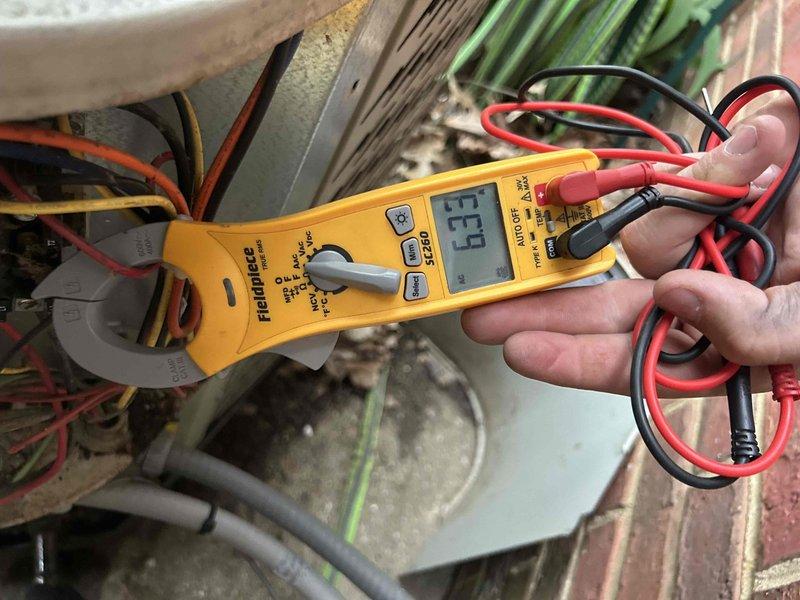 Completed preventative maintenance tune-up on dual HVAC systems located in basement and attic. Performed comprehensive electrical diagnostics using clamp meter, measuring amperage draws and verifying proper electrical operation on both units. Inspected all system components, wiring connections, and evaporator coils. Customer provided filters for replacement in both locations (14x25x1 and 16x25x1 sizes). Both systems tested and operating within normal parameters upon completion.