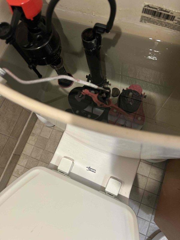 Responded to callback for toilet continuously running after initial service visit. Upon inspection, determined that previously recommended fill valve replacement alone did not resolve the issue. Examined toilet tank components and identified faulty flush valve assembly causing intermittent running. Replaced flush valve assembly and adjusted fill valve settings to manufacturer specifications. Tested system through multiple flush cycles to verify proper operation and confirm issue resolved.