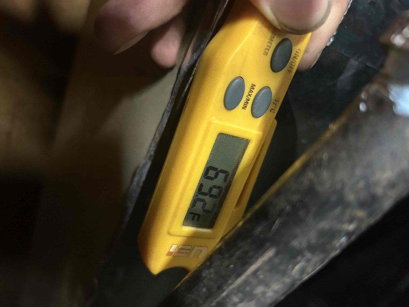 Responded to callback for new HVAC system installed in February with thermostat error messages and inability to cool below 75 degrees. Performed diagnostic testing and measured supply air temperature at 53.7°F and refrigerant line temperature at 206.3°F, confirming system is operating within normal parameters. Reviewed thermostat settings and programming with customer to address cooling concerns.