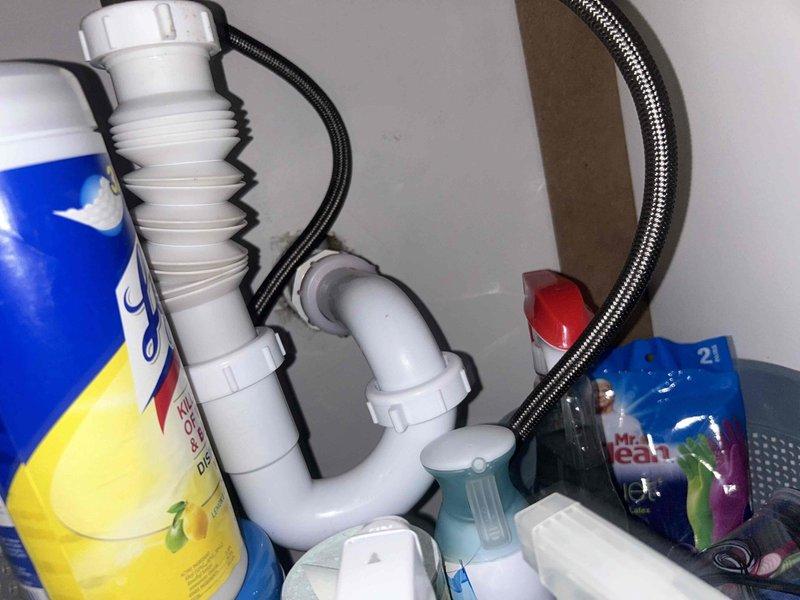 Completed routine plumbing preventative service assessment for residential property. Inspected kitchen sink drain assembly including P-trap, slip-joint connections, and flexible tailpiece for proper operation and potential leaks. Examined bathroom shower system including dual showerhead fixture, wall-mounted arm, handheld spray unit with flexible metal hose, and verified proper water flow and spray patterns. All plumbing fixtures found to be functioning properly with no immediate repairs required.