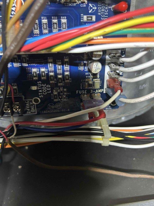 Responded to no cooling call on 20-year-old electric air conditioning system with no airflow and non-operational condenser unit. Performed diagnostic evaluation and identified blown 3-amp fuse on indoor unit control board. Replaced defective fuse, restored power to system, and verified proper operation of blower motor and condenser unit with normal airflow restored.
