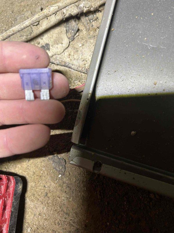 Responded to no cooling call on 20-year-old electric air conditioning system with no airflow and non-operational condenser unit. Performed diagnostic evaluation and identified blown 3-amp fuse on indoor unit control board. Replaced defective fuse, restored power to system, and verified proper operation of blower motor and condenser unit with normal airflow restored.