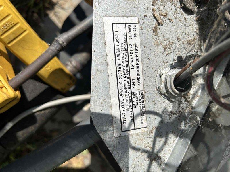 Responded to no cooling complaint on heat pump system. Upon arrival, performed diagnostic evaluation of indoor air handler unit located in closet. Measured supply air temperature at ductwork registering 133°F, indicating system operating in heat mode rather than cooling mode. Inspected outdoor heat pump unit and verified manufacturer specifications on equipment nameplate. Identified thermostat wiring or reversing valve issue preventing proper mode changeover from heating to cooling operation. System requires correction of control circuit or reversing valve to restore proper cooling function.