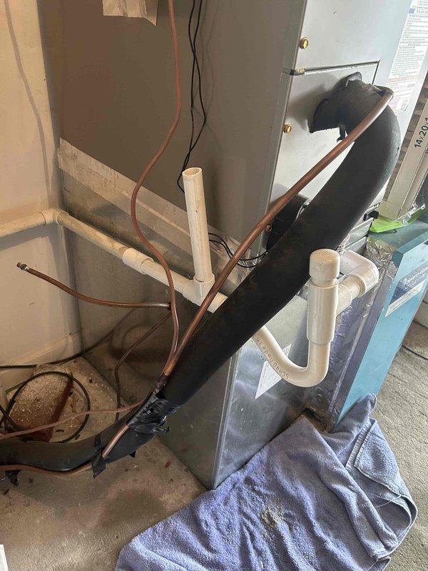Responded to call back for 7-year-old heat pump system with no cooling and intermittent thermostat power loss following previous service on 7/29. Found condensate drainage issue causing safety float switch activation, resulting in system shutdown and thermostat display going blank. Cleared condensate line blockage, verified proper drainage through P-trap assembly, and tested condensate pump operation. Confirmed 24V power supply to thermostat restored and stable. Cycled system through complete cooling operation, verified proper airflow from air handler, and confirmed indoor temperature pulldown. System operating normally with no further power interruptions to thermostat.