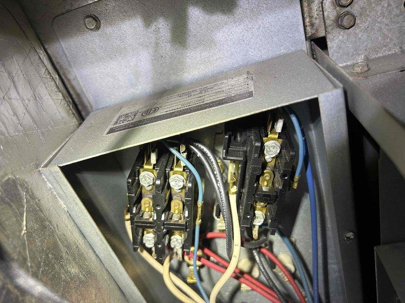 Responded to no cooling complaint on air handler/heat pump system with reported humming noise at outdoor unit. Upon inspection, found failed dual run capacitor preventing compressor from starting, confirming previous maintenance observation of capacitor deterioration. Replaced defective capacitor with manufacturer-specified replacement and verified proper compressor amperage draw and system operation. Additionally noted significant dust and lint accumulation on evaporator coil restricting airflow, which was documented for future maintenance scheduling. Tested system through complete cooling cycle, confirmed proper refrigerant pressures, verified adequate airflow at registers, and restored normal cooling operation. System operating within manufacturer specifications at time of departure.