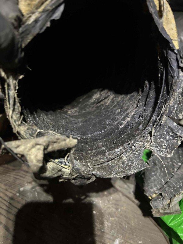 Responded to water leak complaint at third-floor indoor unit where condensate drainage issue had created puddling. Upon inspection in attic space, found condensate drain line with significant debris accumulation and confirmed restricted drainage flow. Cleared blockage from condensate line, verified proper drainage operation, and inspected surrounding ductwork for any water damage or secondary concerns.