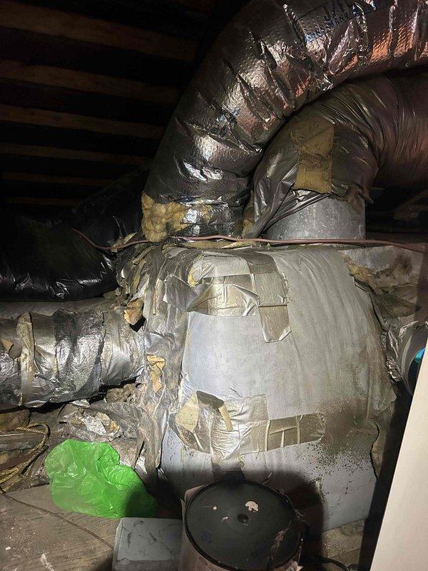 Responded to water leak complaint at third-floor indoor unit where condensate drainage issue had created puddling. Upon inspection in attic space, found condensate drain line with significant debris accumulation and confirmed restricted drainage flow. Cleared blockage from condensate line, verified proper drainage operation, and inspected surrounding ductwork for any water damage or secondary concerns.