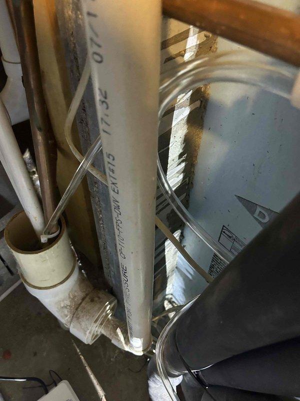 Completed installation of WaterFurnace 5 Series 3-ton geothermal heat pump system (model W5AV036BD1A02CTR2B00) with up to 30 EER rating. Installed EAL10B 10kW supplemental heat kit and TPCC32U02 touch screen thermostat for enhanced climate control. Connected unit to existing flow center using CK4L-GLI hose kit, ensuring proper integration with geothermal loop system.

Modified return air drop to accommodate new equipment configuration. Utilized AID tool for system setup and airflow staging per manufacturer specifications. Implemented comprehensive property protection measures including drop cloths, ram board, and additional manpower with hand dollies to prevent floor damage during equipment placement in mechanical space.

Completed all copper and PVC piping connections to geothermal unit, securing lines with proper clamps and brackets. Installed insulated ductwork with reflective vapor barrier wrapping to maximize efficiency. Verified all electrical connections, thermostat wiring, and 