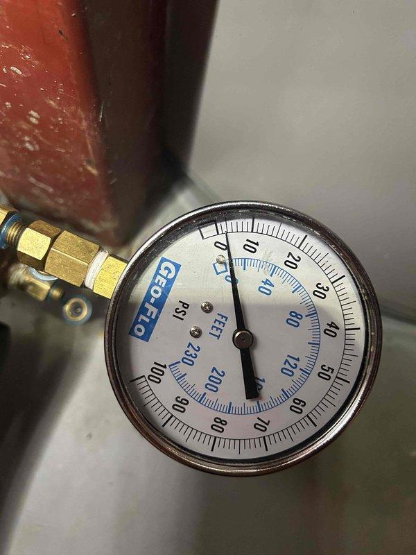 Completed annual preventative maintenance tune-up on three geothermal HVAC systems in basement as part of Gold Level care plan. Inspected all three units, checked washable filters, verified system pressures reading at 0 PSI on expansion tank gauge, and measured supply air temperature at 58.5°F. All systems operating within normal parameters with no issues identified.
