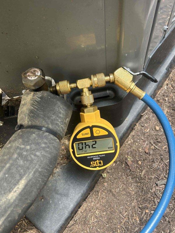 Replaced defective evaporator coil under warranty with new unit (serial number RCFZ3617STANVU/W2626) and recharged system with 7.5 pounds of refrigerant. Installed two 2-inch PVC couplings as required for proper drainage. Verified system pressures and operation using manifold gauges, confirming proper refrigerant charge and normal operating parameters upon completion.