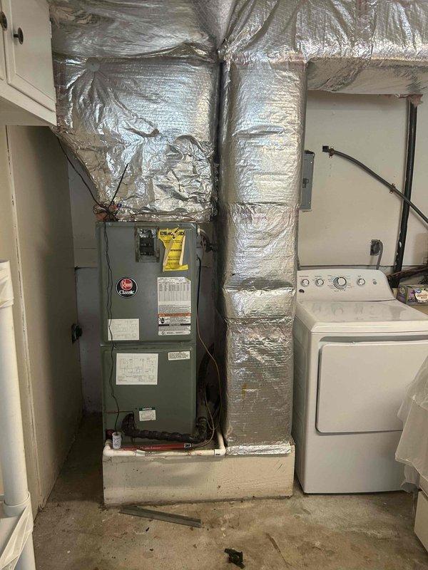 Responded to no cooling call on 9-year-old Rheem air conditioning system (Model RHSA-HMQ017JA, manufactured 07/2006). Upon arrival, performed diagnostic evaluation of the condensing unit that had stopped operating. Inspected electrical components, verified voltage specifications at 208/240V single-phase, and assessed overall system functionality to identify the cause of failure and restore cooling operation to the residence.