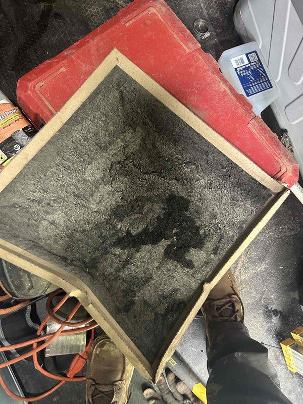 Responded to no cooling complaint on 2-year-old residential AC system that was frozen up and not operating. Upon inspection, found severely clogged air filter restricting airflow, which caused evaporator coil to freeze. Removed and replaced dirty filter, allowed system to thaw completely, and verified proper airflow through evaporator coil. System returned to normal cooling operation with adequate airflow restored.