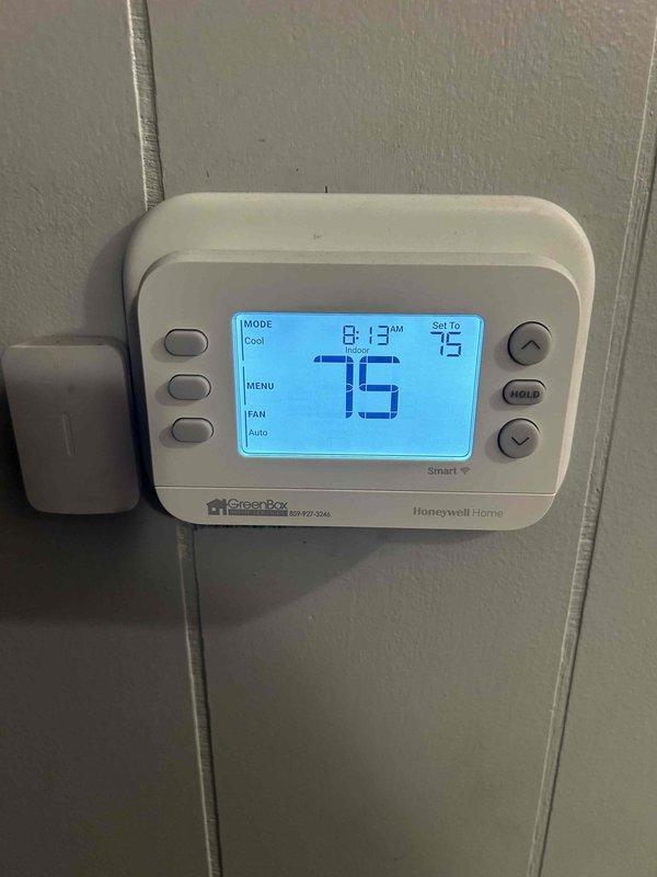# HVAC Maintenance Completed

Performed comprehensive Gold Level annual maintenance on single-system HVAC unit installed October 2026. Conducted full system inspection and diagnostics, including electrical current measurement showing 53.0 amp draw on compressor circuit using clamp meter. Verified thermostat operation and calibration with Honeywell Home smart thermostat displaying proper communication and temperature control at 75°F setpoint in cooling mode. Inspected all electrical connections, wiring harnesses, and junction box terminals for proper contact and absence of heat damage. Evaluated refrigerant lines, copper piping, and flex ductwork connections for leaks and proper insulation. System operating within normal parameters with no deficiencies noted. All prepaid maintenance tasks completed per Gold Level service agreement specifications.