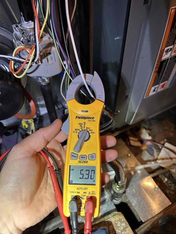 # HVAC Maintenance Completed

Performed comprehensive Gold Level annual maintenance on single-system HVAC unit installed October 2026. Conducted full system inspection and diagnostics, including electrical current measurement showing 53.0 amp draw on compressor circuit using clamp meter. Verified thermostat operation and calibration with Honeywell Home smart thermostat displaying proper communication and temperature control at 75°F setpoint in cooling mode. Inspected all electrical connections, wiring harnesses, and junction box terminals for proper contact and absence of heat damage. Evaluated refrigerant lines, copper piping, and flex ductwork connections for leaks and proper insulation. System operating within normal parameters with no deficiencies noted. All prepaid maintenance tasks completed per Gold Level service agreement specifications.