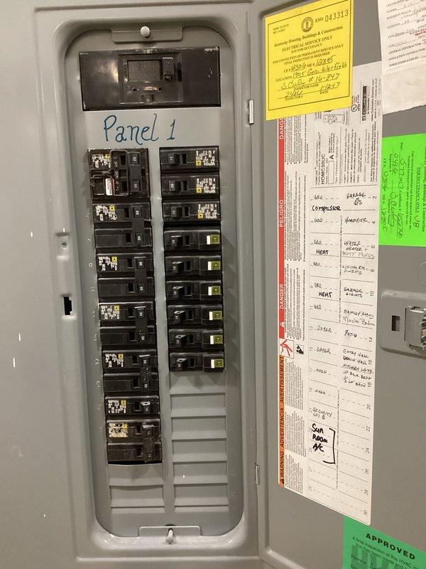 Conducted electrical site assessment for natural gas standby generator installation with focus on Kohler equipment options. Evaluated existing 200-amp main electrical panel and documented current circuit configuration to determine load requirements for automatic transfer switch integration. Assessed natural gas supply infrastructure and meter location for generator fuel connection feasibility. Primary objective is backup power for critical loads including sump pump system during utility outages, requiring load calculation analysis and transfer switch sizing to ensure proper emergency power distribution.
