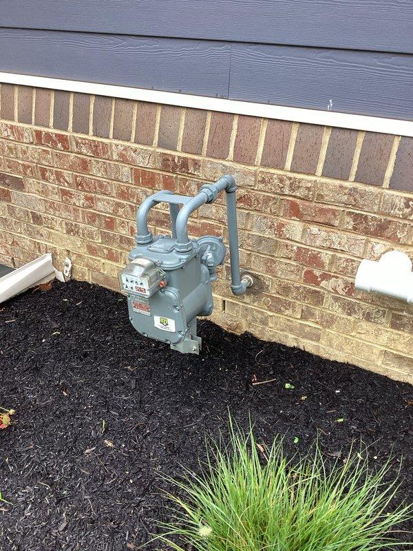 Conducted electrical site assessment for natural gas standby generator installation with focus on Kohler equipment options. Evaluated existing 200-amp main electrical panel and documented current circuit configuration to determine load requirements for automatic transfer switch integration. Assessed natural gas supply infrastructure and meter location for generator fuel connection feasibility. Primary objective is backup power for critical loads including sump pump system during utility outages, requiring load calculation analysis and transfer switch sizing to ensure proper emergency power distribution.