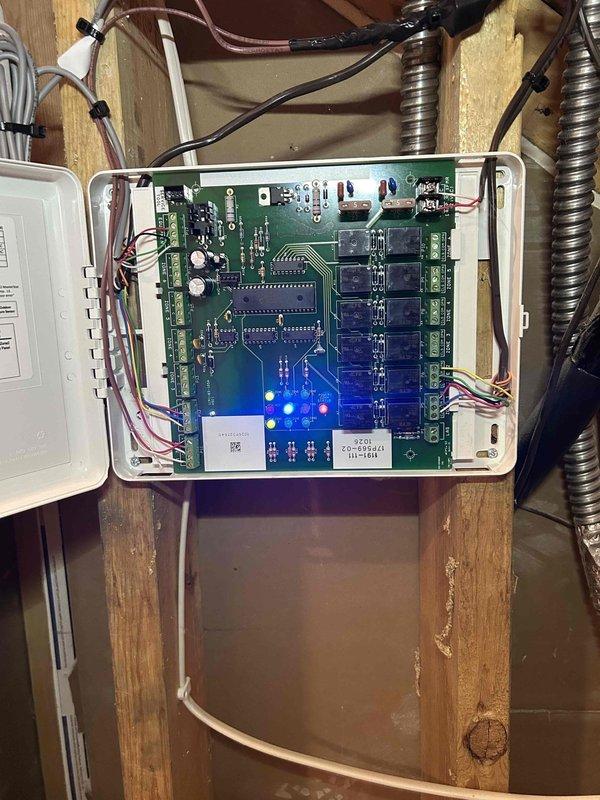 Installed Intellazone 2-24v zoning control system and replaced two existing thermostats with TPCC32U03WWAP color touchscreen models to enable multi-zone temperature control. Completed all electrical wiring connections to the control board terminal blocks for zone management, programmed the system for proper zone operation, and verified all LED indicators and zone functions were operational. Installation required approximately three hours to mount equipment, run wiring, configure system parameters, and test zone switching capabilities.
