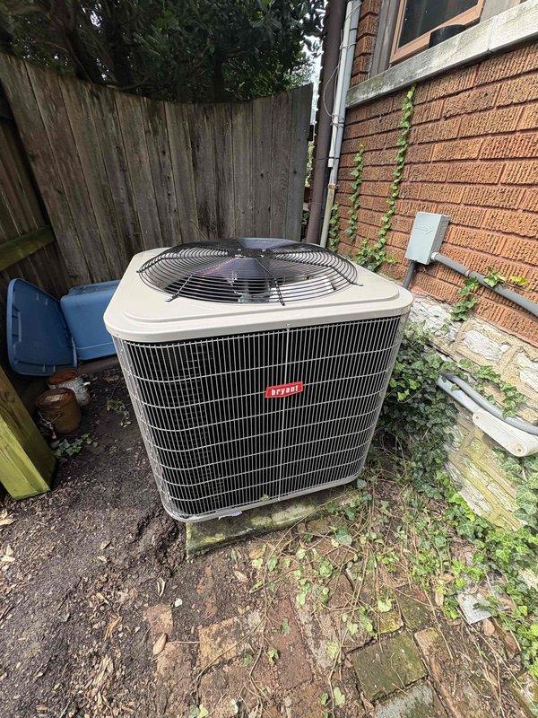 Completed full residential HVAC system replacement including Bryant 5-ton 16 SEER2 Legacy heat pump (model 235SAN06000A), Bryant 5-ton air handler (model FJ5ANXD60L00), and Bryant 15kW heat kit (model TU-EC-15BKB). Removed and disposed of existing equipment per code requirements. Installed outdoor heat pump unit on existing pad with snow legs, electrical whip kit, disconnect box, insulated refrigerant lines, and refrigerant line filter. Mounted air handler in attic space with auxiliary drain pan equipped with safety switch, SS2 coil drain safety water sensor, and "Ceiling Saver" overflow drain pan with water sensor. Installed trap and transitioned to existing ductwork with standard-sized air filter rack. Integrated system with existing thermostat. Completed all electrical connections, refrigerant line installation with proper insulation, and verified system operation. Obtained applicable permits and ensured all work met code compliance standards.