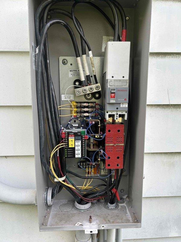 Responded to service call for 30kW Generac Guardian Series generator that failed to operate during recent power outage. Performed comprehensive diagnostic evaluation and overdue preventive maintenance service. Inspected transfer switch panel, verified proper electrical connections at main service panel, checked all circuit breakers and bus bar connections, and tested automatic transfer switch operation. Completed full generator maintenance including oil and filter change, air filter replacement, spark plug inspection, battery load test, and coolant level verification. Exercised unit under load, confirmed proper voltage output and frequency regulation, and verified seamless transfer switch functionality between utility and generator power sources.