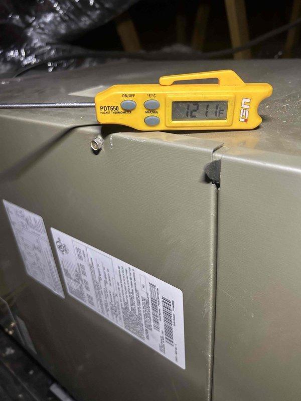 Responded to no cooling call with indoor temperature reaching 85°F. Upon inspection, found attic-mounted air handler operating with supply air temperature of 127.4°F, indicating complete loss of cooling capacity. Thermostat displayed 80°F actual temperature with setpoint of 70°F in cooling mode. Performed diagnostic evaluation of system components to identify cause of cooling failure and documented equipment conditions for repair recommendations.