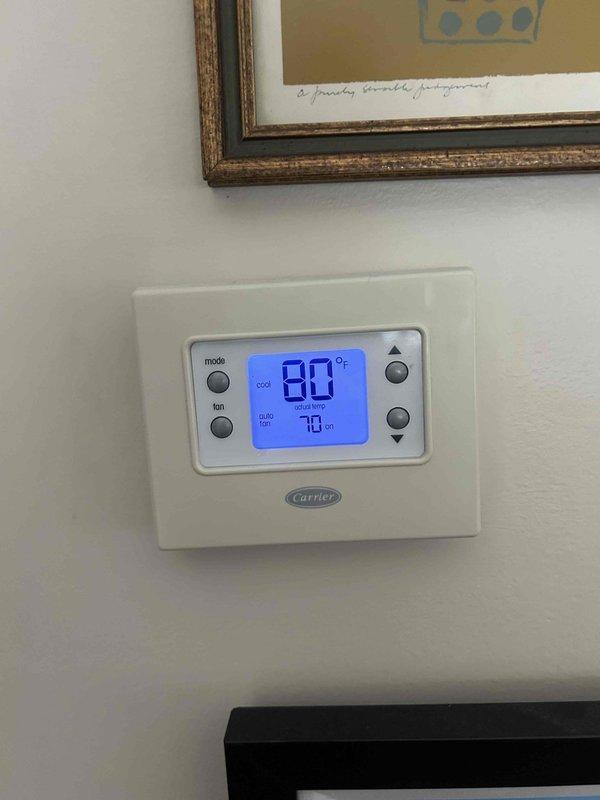 Responded to no cooling call with indoor temperature reaching 85°F. Upon inspection, found attic-mounted air handler operating with supply air temperature of 127.4°F, indicating complete loss of cooling capacity. Thermostat displayed 80°F actual temperature with setpoint of 70°F in cooling mode. Performed diagnostic evaluation of system components to identify cause of cooling failure and documented equipment conditions for repair recommendations.