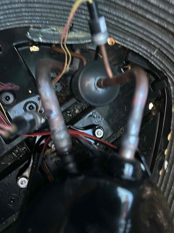 Completed warranty compressor replacement on Trane unit. Removed failed compressor, installed new replacement compressor with proper refrigerant line connections and electrical wiring. Installed new filter drier as part of compressor changeout procedure. Documented and photographed old and new compressor tag information for warranty claim submission. Verified all electrical connections, refrigerant line integrity, and proper component mounting upon completion.