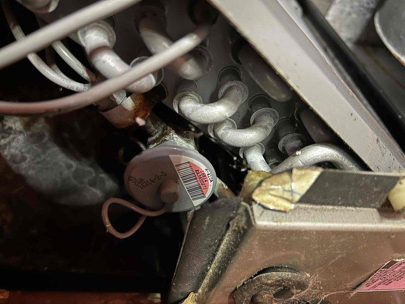 Responded to no cooling complaint on 12-year-old upstairs electric HVAC system. Upon arrival, confirmed indoor unit was running but not producing cool air. Performed diagnostic evaluation of the system, including inspection of the indoor air handler and associated components. Examined the R410A refrigerant system, electrical connections, and compressor operation per manufacturer specifications on the unit nameplate (Model ND23BG10CN0GN0AN). Identified issue preventing proper cooling cycle. Inspected coil assembly, refrigerant lines, and mechanical connections showing normal wear consistent with system age. Customer advised of findings and repair options to restore cooling functionality to the upstairs zone.