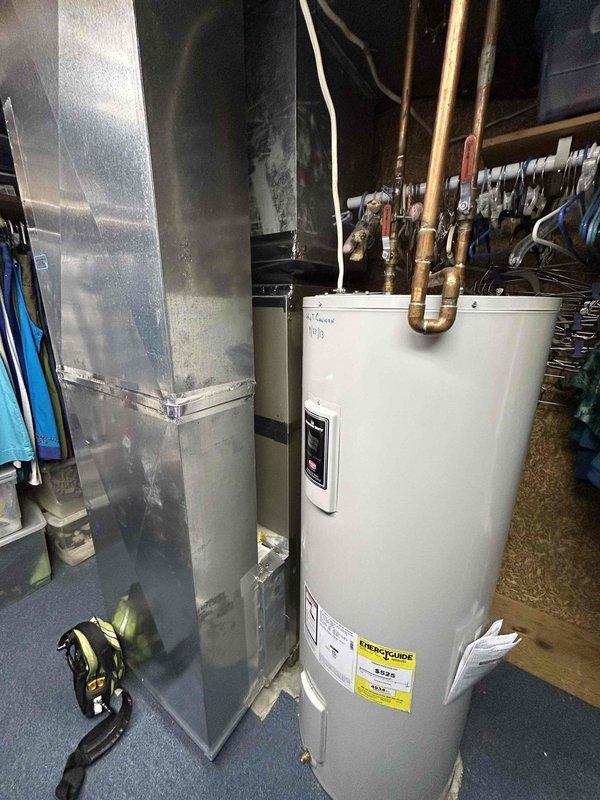 Responded to no cooling complaint on 20+ year old Payne electric HVAC system. Performed diagnostic evaluation of outdoor condenser unit and indoor air handler located in basement. System assessed for refrigerant levels, electrical components, compressor operation, and airflow restrictions. Photos documented equipment condition including outdoor unit placement, refrigerant line connections, and indoor air handler with associated ductwork. Customer advised of findings and repair options for aging system.