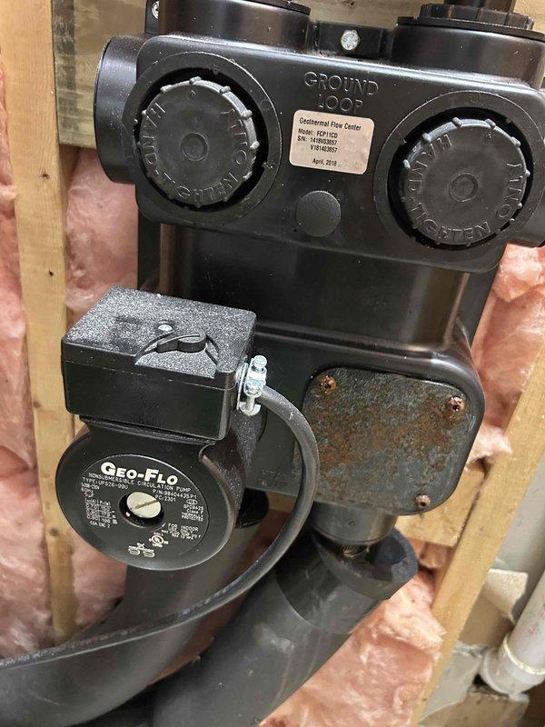 Completed annual maintenance visit on geothermal heating system as part of 10-year care plan. Performed comprehensive system inspection including pressure testing of refrigerant lines using calibrated gauges, verified proper operation of Geo-Flo circulation pump, and inspected flow control valve assembly with interlock controls for proper functionality. All components operating within normal parameters. Documented system conditions with detailed photographs per buyer's request for property transfer records. Retrieved previously left equipment from site.