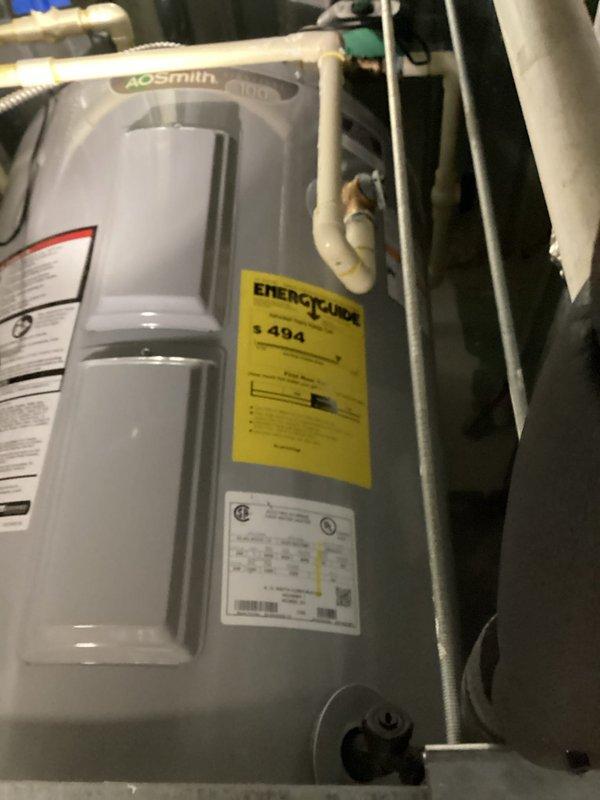Installed Taco LeakBreaker 3/4" NPT water heater shut-off valve and actuator system on A.O. Smith water heater as part of warranty service. Device mounted and wired with indicator lights operational; however, possible recall identified requiring technician to return with replacement unit per management directive.