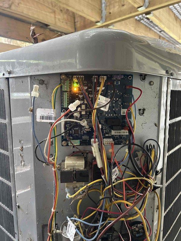 Diagnosed faulty outdoor control board on Carrier Infinity system and quoted replacement repair. Board requires ordering with 2-3 day lead time as part is not available in local Lexington stock. Documented existing thermostat operation showing system actively cooling and captured internal control panel wiring configuration for reference during upcoming board replacement.
