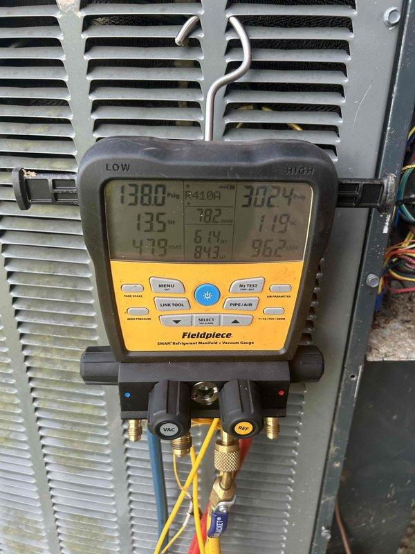 Responded to service call back for upstairs HVAC system not maintaining temperature setpoint, with unit reading 77°F while set to 72°F. Upon inspection, found heavily soiled air filter with significant dust and debris accumulation restricting airflow. Replaced dirty filter and performed system diagnostics using refrigerant manifold gauge to verify operating pressures and temperatures. Confirmed system is now cooling properly with adequate airflow and proper refrigerant charge levels.