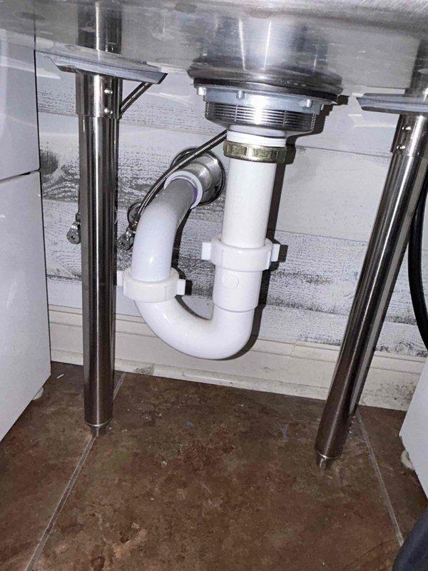 Performed scheduled tankless water heater flush maintenance to remove mineral buildup and maintain optimal unit performance. Completed comprehensive whole home plumbing inspection, verifying proper operation of all fixtures including kitchen sink drainage system, P-trap assembly, and supply lines. All plumbing components found in good working condition with no leaks or deficiencies noted.