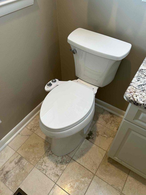Removed two existing toilets and installed two new Kohler ADA-compliant handicap height toilets in separate bathroom locations. Both units were staged from warehouse inventory prior to installation. All installations included new wax rings, supply line connections, floor mounting hardware, and leak testing to ensure proper operation and sealing.