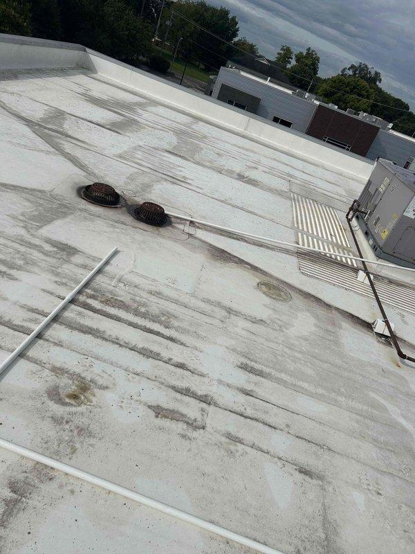 Completed installation of condensate drainage system on commercial flat roof, running new PVC condensate lines from HVAC unit to existing roof drains. Installed approximately 60 feet of PVC pipe with appropriate couplings and support standoffs to ensure proper pitch and drainage flow. Two-hour installation ensures proper condensate removal from rooftop HVAC equipment to prevent water accumulation and potential equipment damage.