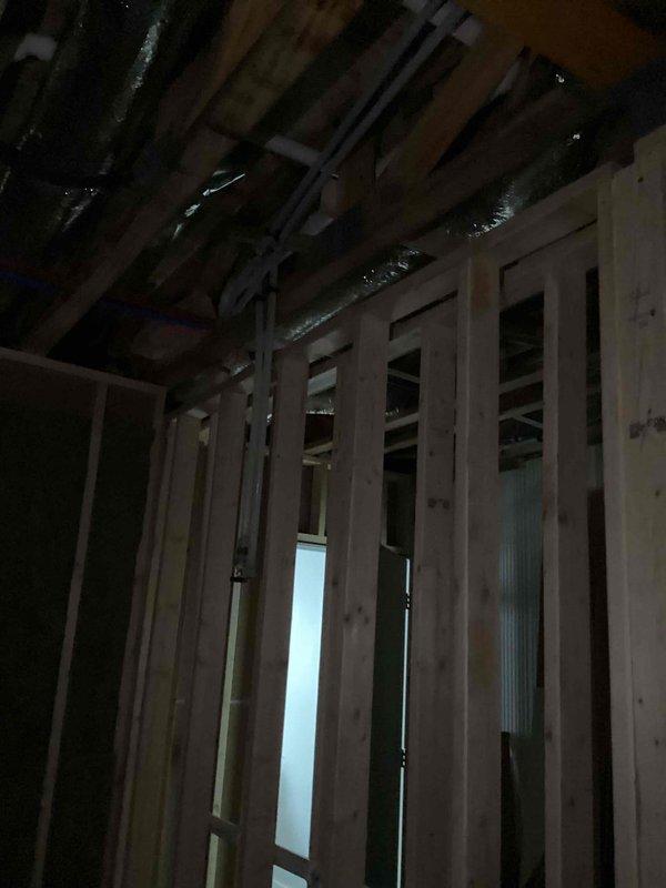 Conducted on-site plumbing estimate for basement bathroom fixture installations where rough-in plumbing was already completed. Assessed existing PVC drain lines, water supply lines including PEX tubing, and structural framing to determine scope of work needed for final fixture hookups. Customer will complete their own drywall finishing and fixture placement, requiring estimate for connection of toilets, sinks, and bathing fixtures to the pre-installed rough plumbing infrastructure.