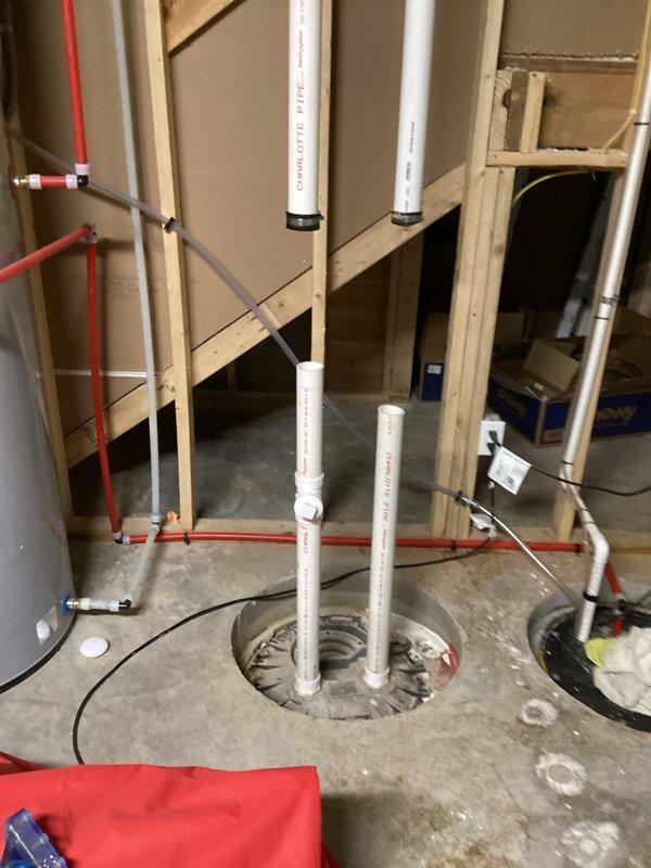 Conducted on-site plumbing estimate for basement bathroom fixture installations where rough-in plumbing was already completed. Assessed existing PVC drain lines, water supply lines including PEX tubing, and structural framing to determine scope of work needed for final fixture hookups. Customer will complete their own drywall finishing and fixture placement, requiring estimate for connection of toilets, sinks, and bathing fixtures to the pre-installed rough plumbing infrastructure.