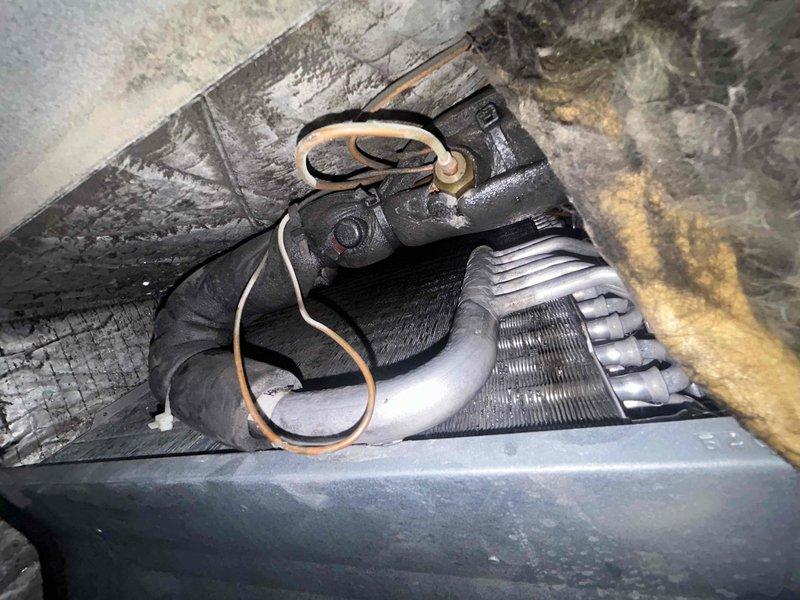 Responded to no cooling complaint on 3-year-old mini-split system experiencing freeze-up condition. Upon inspection, discovered severely clogged evaporator coil with heavy dust and debris accumulation restricting airflow, which was causing the coil to ice over and preventing proper heat exchange. Cleaned evaporator coil thoroughly, removed accumulated contaminants, and verified system operation. Recommended regular filter maintenance and periodic coil cleaning to prevent recurrence of airflow restriction issues.