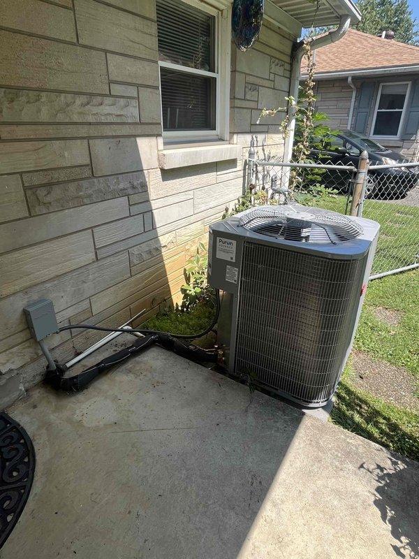 Completed full residential air conditioning system installation including Bryant 2.5 ton up to 17 SEER2 outdoor condensing unit (model GA5SAN53000W) and matching Bryant evaporator coil (model CVAVA3017XMA). Installed outdoor unit on concrete pad with electrical disconnect box and whip kit for proper power supply. Ran and insulated refrigerant lines from outdoor condenser to indoor evaporator coil, installed refrigerant line filter drier for system protection. Mounted evaporator coil in existing air handler cabinet with proper transitions to existing ductwork. Installed SS2 coil drain safety water sensor to prevent overflow damage. Removed and properly disposed of existing equipment per environmental regulations. Pulled all applicable permits and completed installation to current code compliance standards. Evacuated refrigerant lines, charged system to manufacturer specifications, and performed complete operational testing to verify proper cooling performance, airflow, and safety contro
