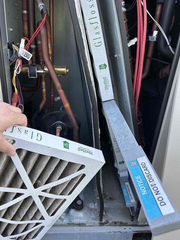 Completed monthly recurring maintenance on commercial HVAC system with 6 heat pumps and 6 air handlers. Replaced multiple air filters in various sizes: (4) 20x20x1, (6) 16x25x1, (4) 16x20x2, and (4) 20x25x2, plus 2 additional filter changes under separate care plan coverage. Verified thermostat operation and settings, confirmed proper system controls and temperature readings. Inspected internal components including blower motor assembly, copper refrigerant lines, electrical connections, and wiring. All equipment operating within normal parameters with no issues identified.