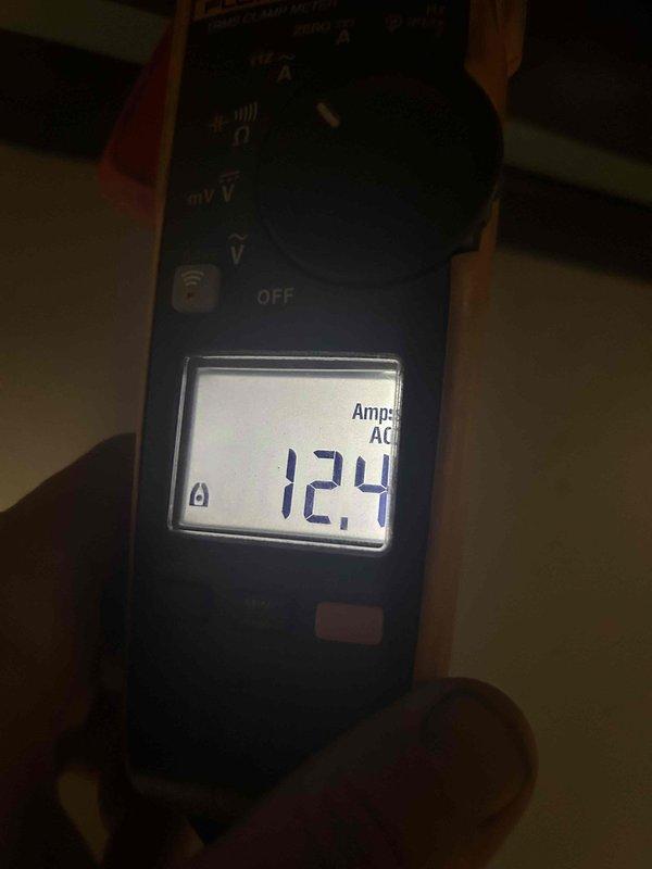 Completed Gold Level annual preventative maintenance on single-system HVAC unit. Performed comprehensive system diagnostics including electrical testing with multimeter showing 12.4 amp draw and pressure testing with gauge reading at zero PSI. Inspected copper refrigerant lines, brass fittings, and associated piping components to ensure proper operation and system integrity.