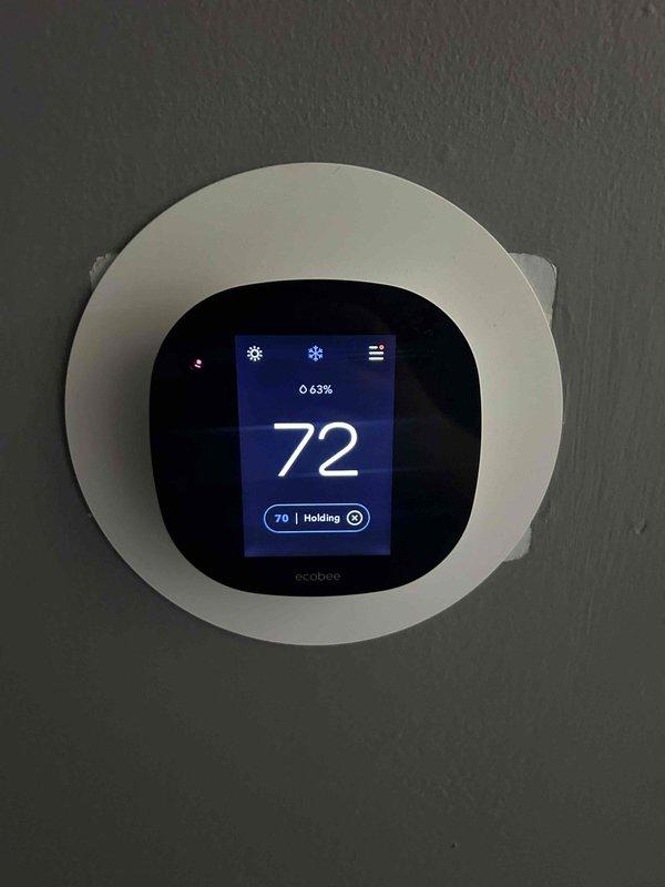 Completed Gold Level annual preventive maintenance on a 5-month-old package HVAC system. Performed comprehensive inspection of all major components including electrical connections, capacitor operation, and control systems. Verified proper thermostat functionality with ecobee smart thermostat displaying accurate temperature readings and system response. Inspected dual-run capacitor (SUREPHON CBB65A, 440V) confirming secure mounting, proper wire connections, and electrical specifications within manufacturer tolerances. All system components operating within normal parameters with no deficiencies noted at time of service.