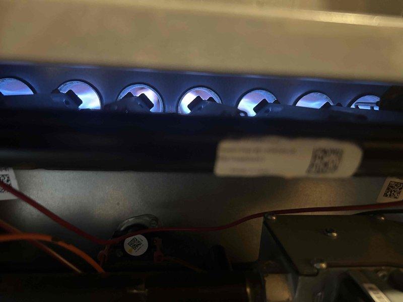 Performed comprehensive Club Duo maintenance on dual-zone mini-split system with heat pump and air handler located in basement and sunroom. Inspected and serviced heating components including gas furnace burner assembly, confirmed proper combustion with characteristic blue flame pattern across all burner ports, and verified gas valve and electrical connections were secure and functioning correctly. Documented system temperatures showing -8.3°F reading on evaporator coil, indicating active cooling cycle operation, and completed standard maintenance procedures on both indoor units using customer-supplied filters.