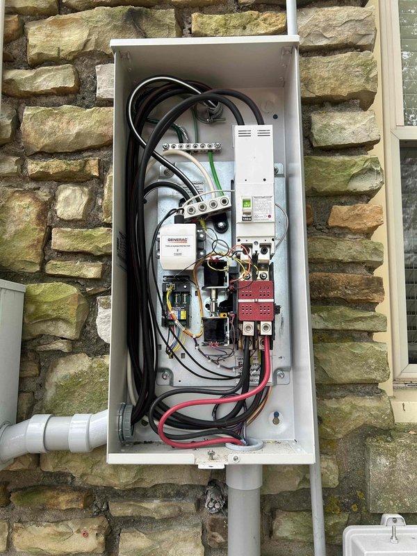 Completed scheduled maintenance on 24KW Generac EVO generator system. Performed standard inspection procedures, verified electrical connections at transfer switch panel and generator unit, and documented installation with required photographs of exterior electrical panel and generator location. All components found operational and properly secured.