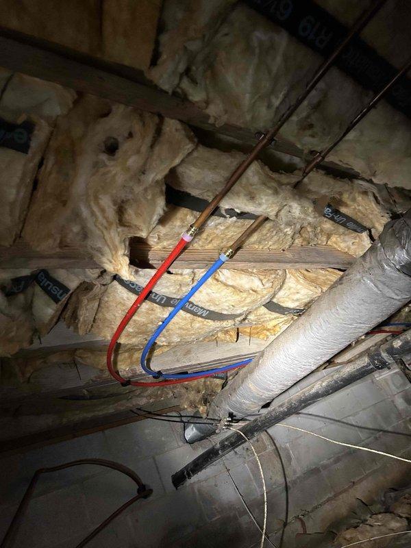 Completed washer box repair by disconnecting existing soft copper supply lines and replacing with Uponor PEX piping to restore proper water pressure to the cold side and eliminate potential kinking issues on the hot side. Verified proper functionality of both hot and cold water supply lines upon completion.

Performed secondary sump pump installation in crawl space by lowering the existing sump pump deeper into the ground to improve water clearance capacity. Installed a new secondary sump pump with check valve on the opposite side of the crawl space to provide redundant drainage protection. Placed grillage material around both sump pump pits to facilitate proper water flow and filtration. Tested both pumps for proper operation and confirmed adequate drainage performance before departure.