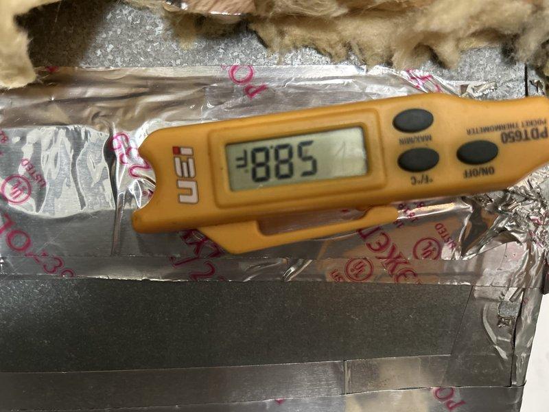 Completed preventative maintenance tune-up on heat pump air handler system located in kitchen closet. Performed comprehensive inspection of blower assembly, noting minor corrosion on motor shaft but confirmed proper operation and airflow. Measured supply air temperature at 28.85°F, indicating system is operating within normal cooling parameters. Inspected ductwork insulation and verified proper sealing of supply plenum connections. All components functioning as designed with no immediate service needs identified.