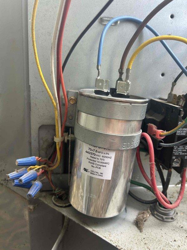 Completed preventive maintenance filter change service on four commercial HVAC units as part of Club Trio maintenance agreement. Replaced two 20x20x1 filters on units located in warehouse closet serving front offices and two 18x20x1 filters on warehouse-mounted units requiring ladder access. Inspected electrical components including capacitor and contactor assembly, verified proper wire connections, and documented equipment condition with photographs per customer requirements.