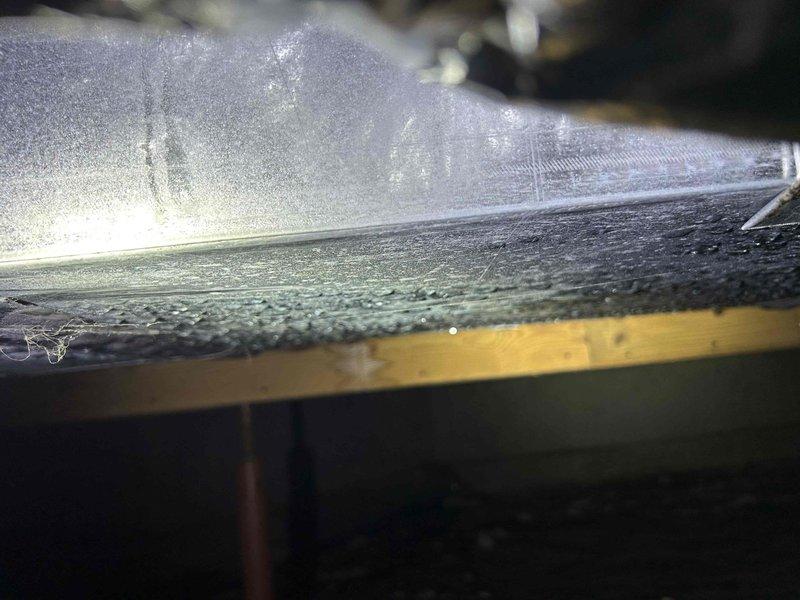 Completed Gold Level annual maintenance on single-system HVAC unit. Inspected indoor air handler and ductwork, documenting significant condensation accumulation on insulated ductwork indicating potential insulation failure or inadequate vapor barrier. Confirmed equipment age, filter specifications, and air handler location as part of comprehensive system evaluation.