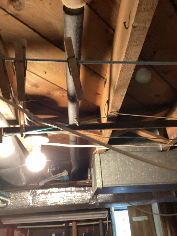 Conducted on-site assessment of residential plumbing shut-off valves requiring replacement due to age and corrosion. Evaluated two fixture shut-off valves (hot and cold water supply lines) and one main water shut-off valve, all exhibiting rust deterioration and operational concerns. Documented existing plumbing infrastructure including PVC piping systems and insulated supply lines in basement/crawlspace area to provide accurate replacement estimate.